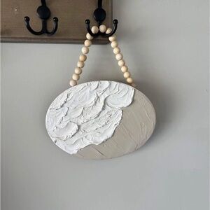 Textured 10” Oval Wall Art with Beaded Hanger